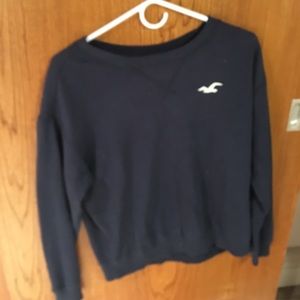 A navy blue crew sweatshirt from Hollister Co.
